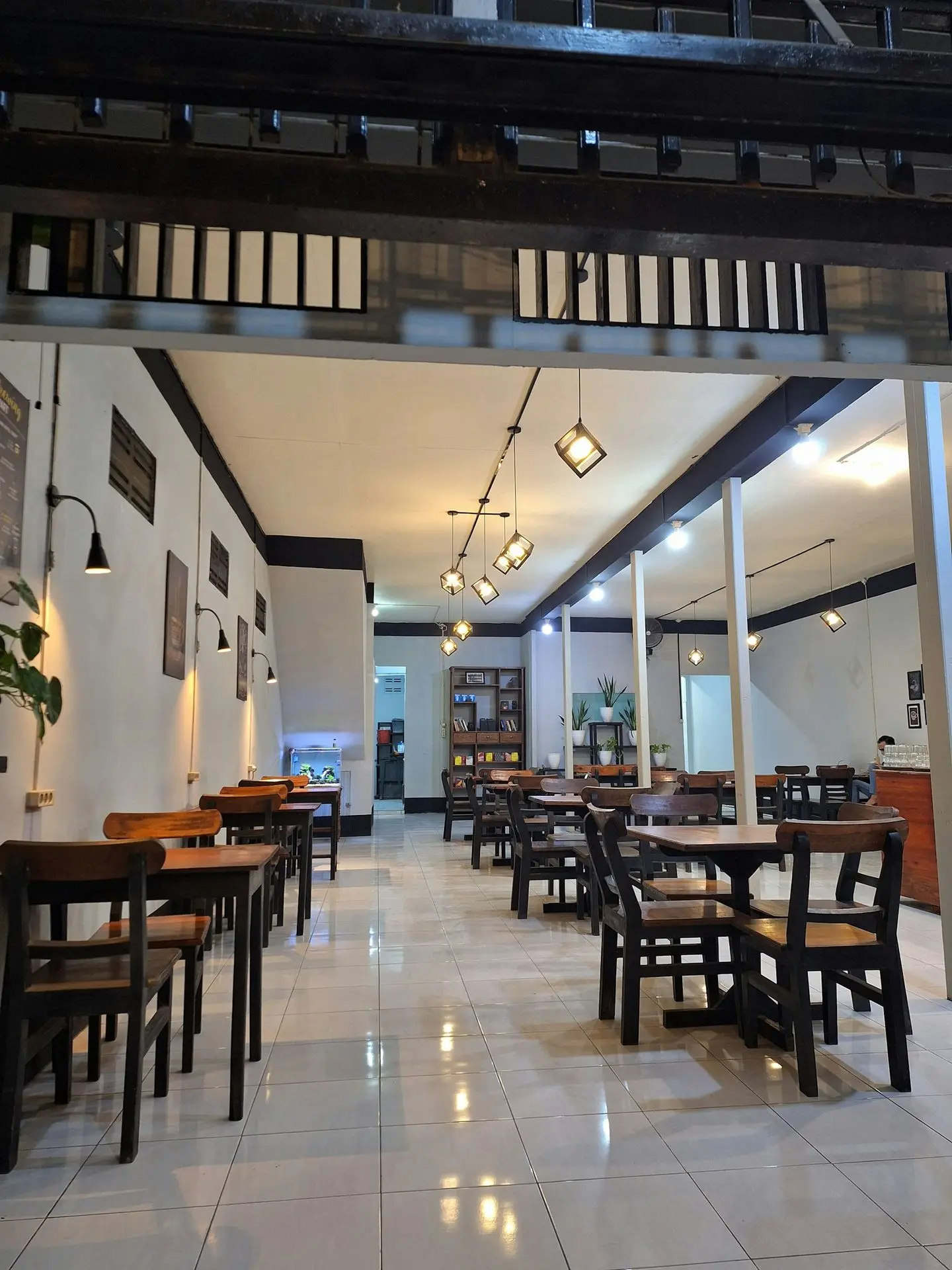 A restaurant with tables and chairs inside of it